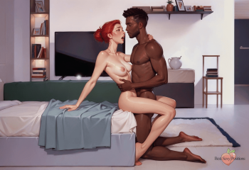 A Black man and his partner making love face to face. He is on his knees and she is on the edge of the bed.